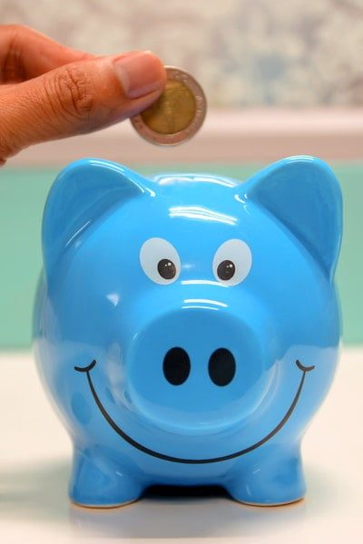 Blue piggy bank link to learn about how to save